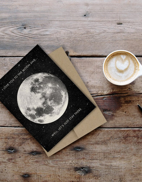 a greeting card that says to the moon and back